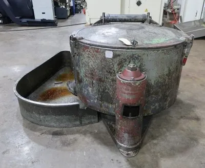 (2) Tolhurst 40" Center-Slung chip wringers.