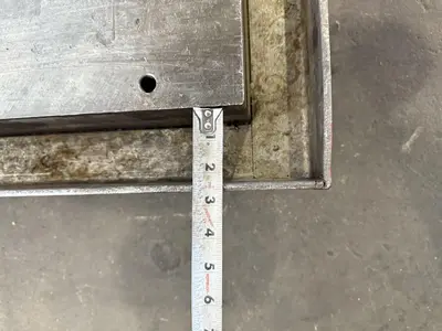 42" WIDE X 72" LONG X 6" THICK T-SLOTTED BOLSTER PLATE. STOCK # 1006324