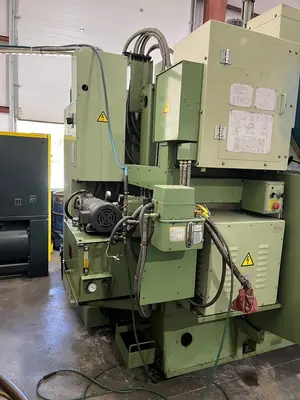 USED 1989 OKUMA MC-4VA
