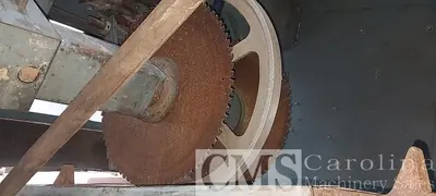 USED NEWMAN KNO 24 9 BLADE TRIM SAW