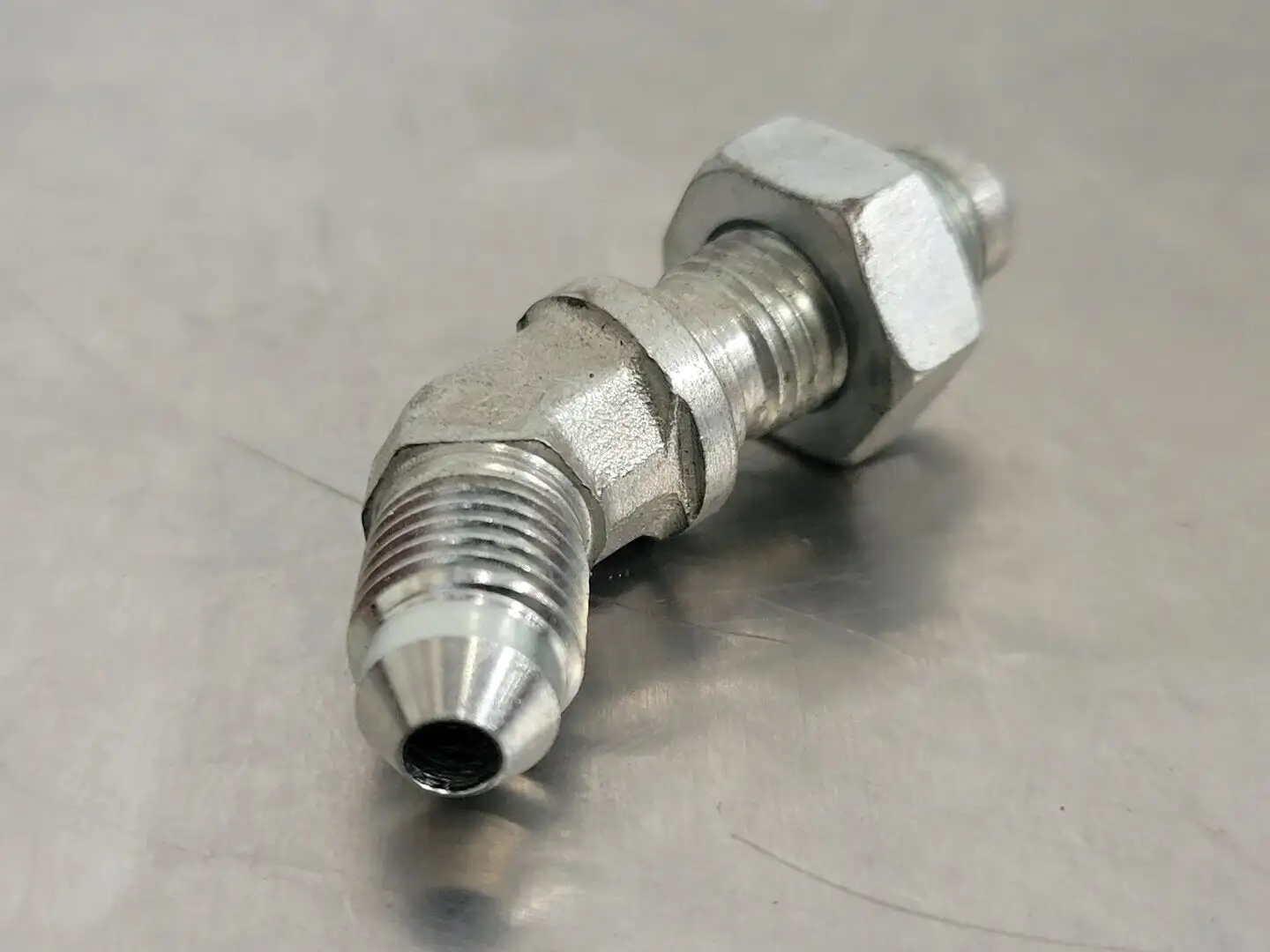 45 Deg Elbow Adapter Bulkhead M-04 JIC X M-04 JIC 1/4" x 1/4" (Bag of 10)