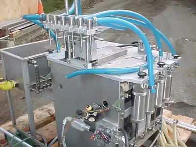 USED ANDERSON PISTON FILLER 8 HEAD PISTON FILLER