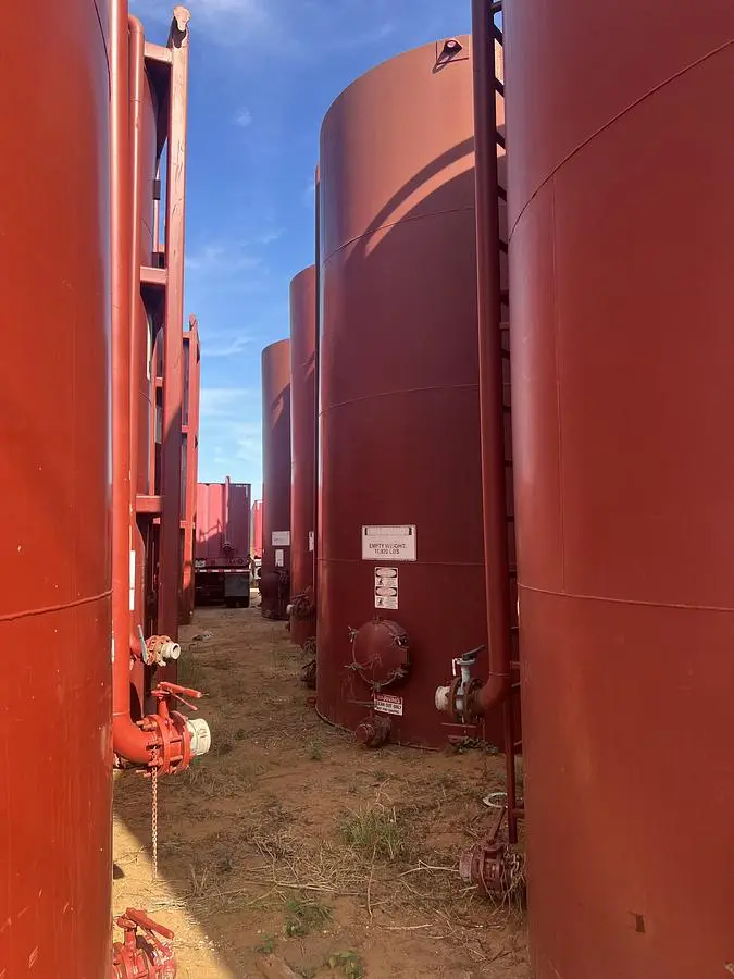 Meridian 400bbl Skidded Vertical Storage Tanks – 12’ x 20’, Carbon Steel, Flat Bottom, Used Basic Refurb