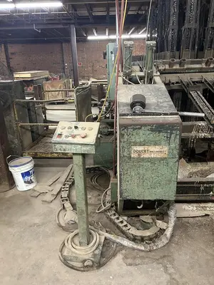 DOUCET CLAMP CARRIER