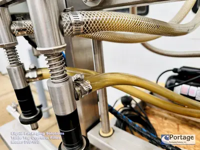 USED 2010 LIQUID PACKAGING 310-150 TT OVERFLOW FILLER
