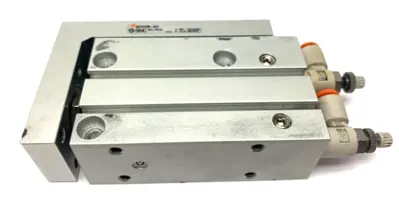 MXH16-30 | SMC  Pneumatic Compact Slide Cylinder Table 0.7MPa Max - Used