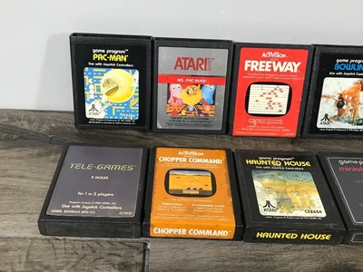 19 - Atari Video Games & 2 Paddle Controllers - see description for more info