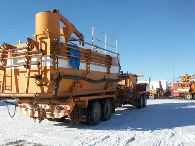 USED 22.5 M3 (140 BBL) SKID MOUNTED 2 COMPARTMENT MUD TANK