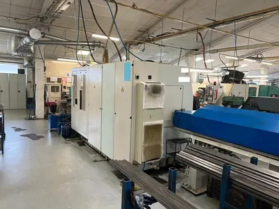 Used 2003 MANURHIN KMX XL 32 CNC Lathes CZ | Amaron s.r.o. #1060907