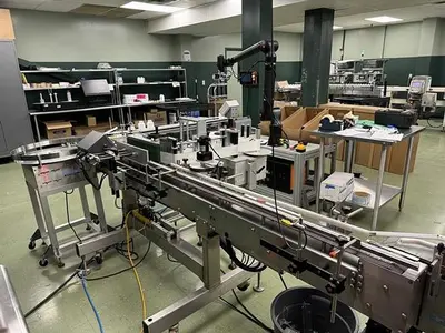 Quadrel model Moduline pressure sensitive wraparound labeler