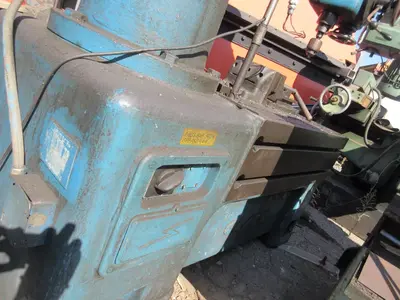 Caser, radial arm drill press