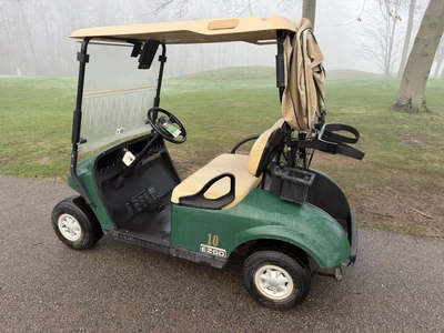 (1) 2015 E-Z-Go golf cart with a Kawasaki gas engine, includes canopy, ball cover, club cover, fold-...