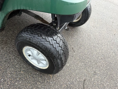 (1) 2015 E-Z-Go golf cart with a Kawasaki gas engine, includes canopy, ball cover, club cover, fold-...