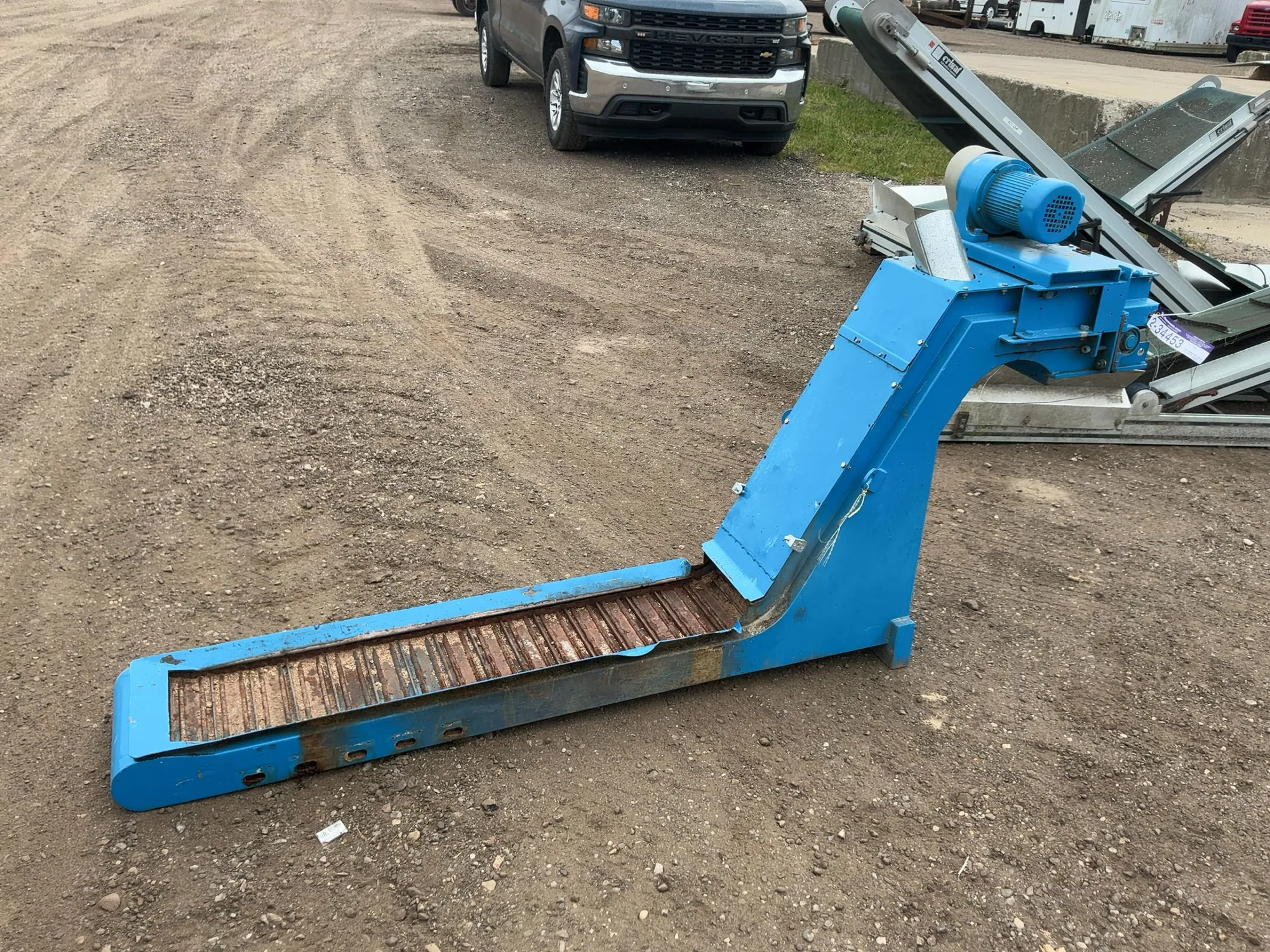 Chip Conveyor, 220/380 Volt 3 Phase Motor, approx. 88” long overall, 9” wide conveyor, Works