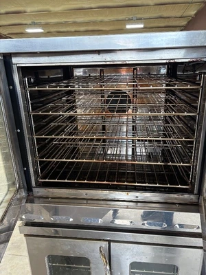 Heavy-duty commercial convection ovens in a stacked configuration