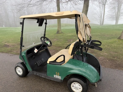 (1) 2017 E-Z-Go golf cart with a Kawasaki gas engine, model 625111G01, includes canopy, ball cover, ...
