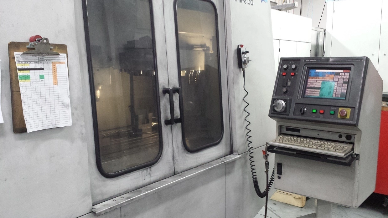 USED 2001 BOSTOMATIC HPM-810G 3-AXIS CNC MILL