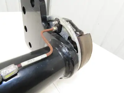 Landoll Front Axle Hub & Brake Assembly Removed From LSC30 Stand On Forklift