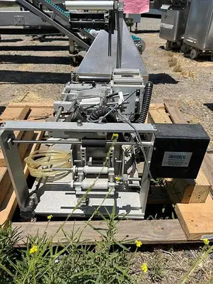 USED UNIVERSAL LABELING SYSTEMS R-310