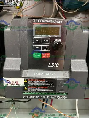 USED HOFFMAN ENCLOSURE W/ 3 TECO WESTINGHOUSE L510 AC DRIVES & IDEC FL1F SMART RELAY