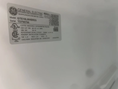 USED GE FREEZER ON TOP