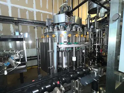 Complete KOSME Bottling Line Includes Depalletizer, Barifill Glass Filler & Flexa Labeler
