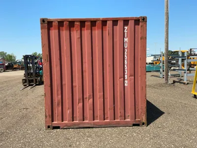 20’ Shipping / Storage Container 8’ wide x 8’ 6” tall, swing doors on one end, wood deck, rings for ...