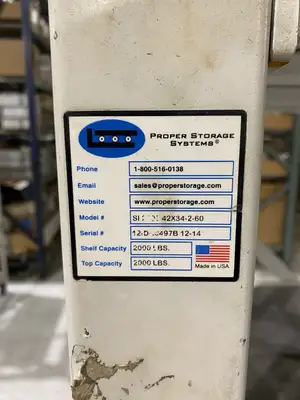 USED PROPER STORAGE SYSTEMS MANUAL ROLL OUT STORAGE DIE SHELVING