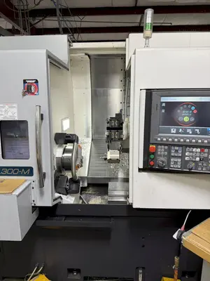 USED 2016 OKUMA GENOS L300MYW