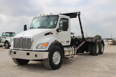 New | in-Stock 2027 PETERBILT 548 Rolloff Trucks Texas US | Roll Off Truck World #1492003
