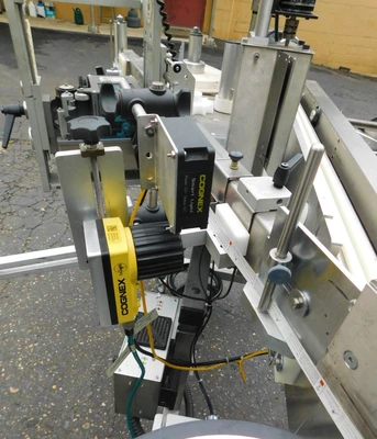 USED NEWMAN WRAP AROUND LABELER NV II