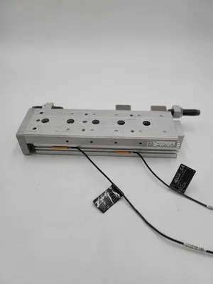 USED SMC SMC MXS16-100 PNEUMATIC SLIDE TABLE - STROKE 100MM