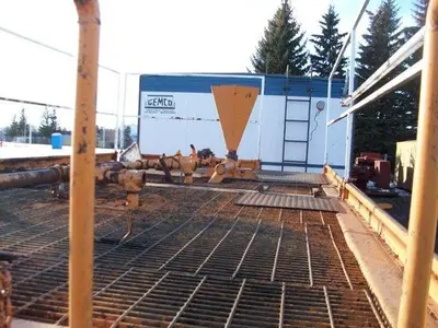 USED 20 M3 (120 BBL) SKID MOUNTED 2 COMPARTMENT MUD TANK