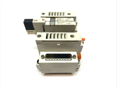 USED SMC PLUG-IN MANIFOLD BASE 4-STATION
