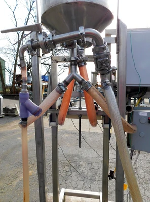 USED FOUR STATION VOLUMETIRIC FILLER FOUR STATION