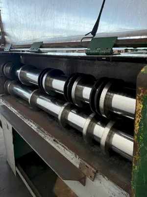 48” X 4" ARBOR STRILICH SLITTING LINE WITH FAMCO CUT OFF SHEAR & AMS CONTROLS. STOCK # 0664425