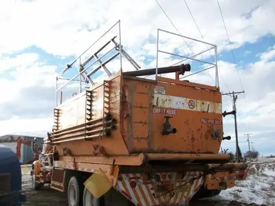 USED 20 M3 (120 BBL) SKID MOUNTED 2 COMPARTMENT MUD TANK
