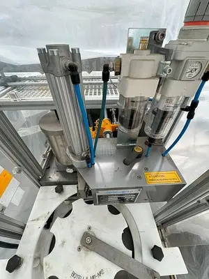 AUXIEMBA HOT MELT ADHESIVE TAX SEAL APPLICATION MACHINE
