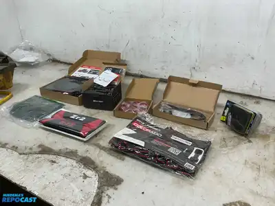 Box of various car parts and accessories including: red and black rearm rest covers, Chevy...