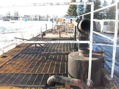 USED 24 M3 (150 BBL) SKID MOUNTED 2 COMPARTMENT MUD TANK
