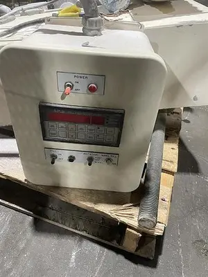 Bartelt model IM7-12 Pouch Packager with AMS Auger Filler