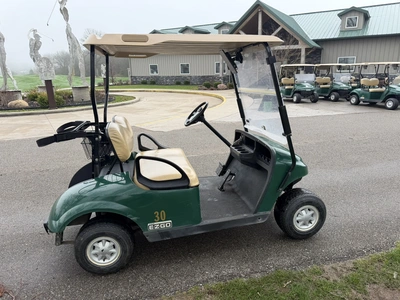 (1) 2015 E-Z-Go golf cart with a Kawasaki gas engine, does not include Club canopy, includes ball wa...