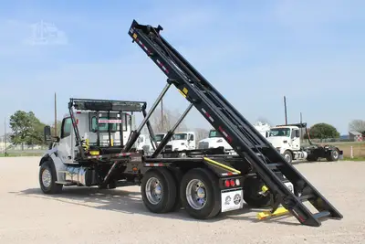 New | in-Stock 2027 PETERBILT 548 Rolloff Trucks Texas US | Roll Off Truck World #1492019
