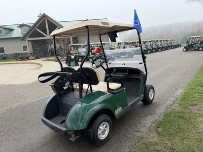 (1) 2015 E-Z-Go golf cart with a Kawasaki gas engine, does not include Club canopy, includes ball wa...