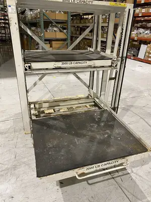 USED PROPER STORAGE SYSTEMS MANUAL ROLL OUT STORAGE DIE SHELVING