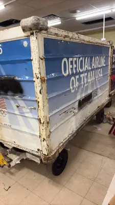 Used Airline Cargo Container with Team USA Graphics and Rolling Base