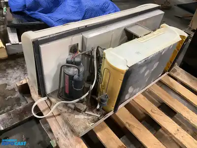Wall Heater make and model unknown with slight exterior damage