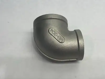 4464K942 | Stainless Steel Threaded Pipe Fitting, 2-1/2" Low-Press. Elbow Reducer - New – Open box