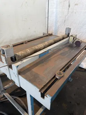 48” X 4" ARBOR STRILICH SLITTING LINE WITH FAMCO CUT OFF SHEAR & AMS CONTROLS. STOCK # 0664425