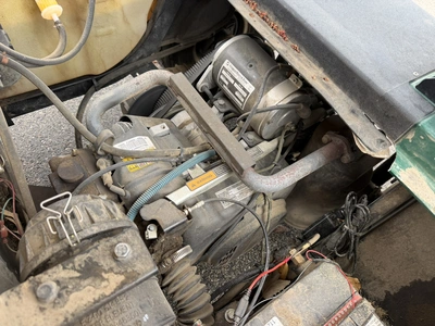 (1) 2015 E-Z-Go golf cart with a Kawasaki gas engine, does not include Club canopy, includes ball wa...